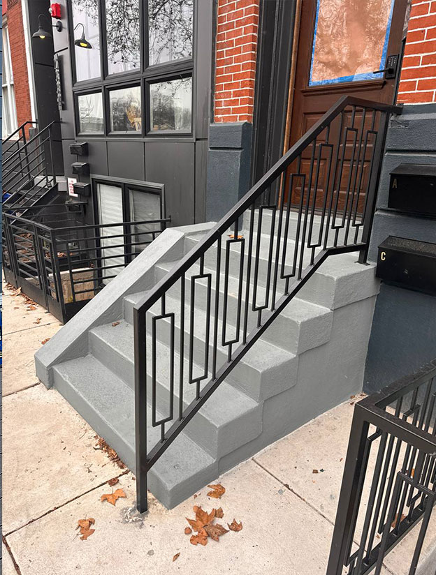 Modern interior staircase with metal railings