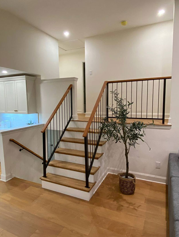 Interior staircase with wood and metal