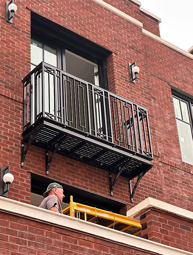 Exterior metal balcony installation