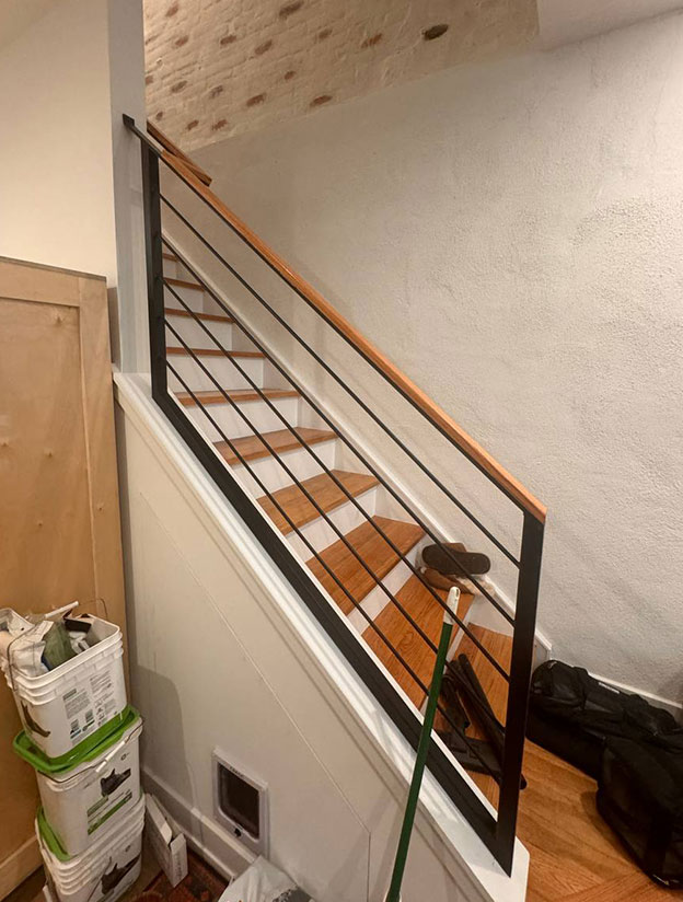 Residential staircase with wood accents